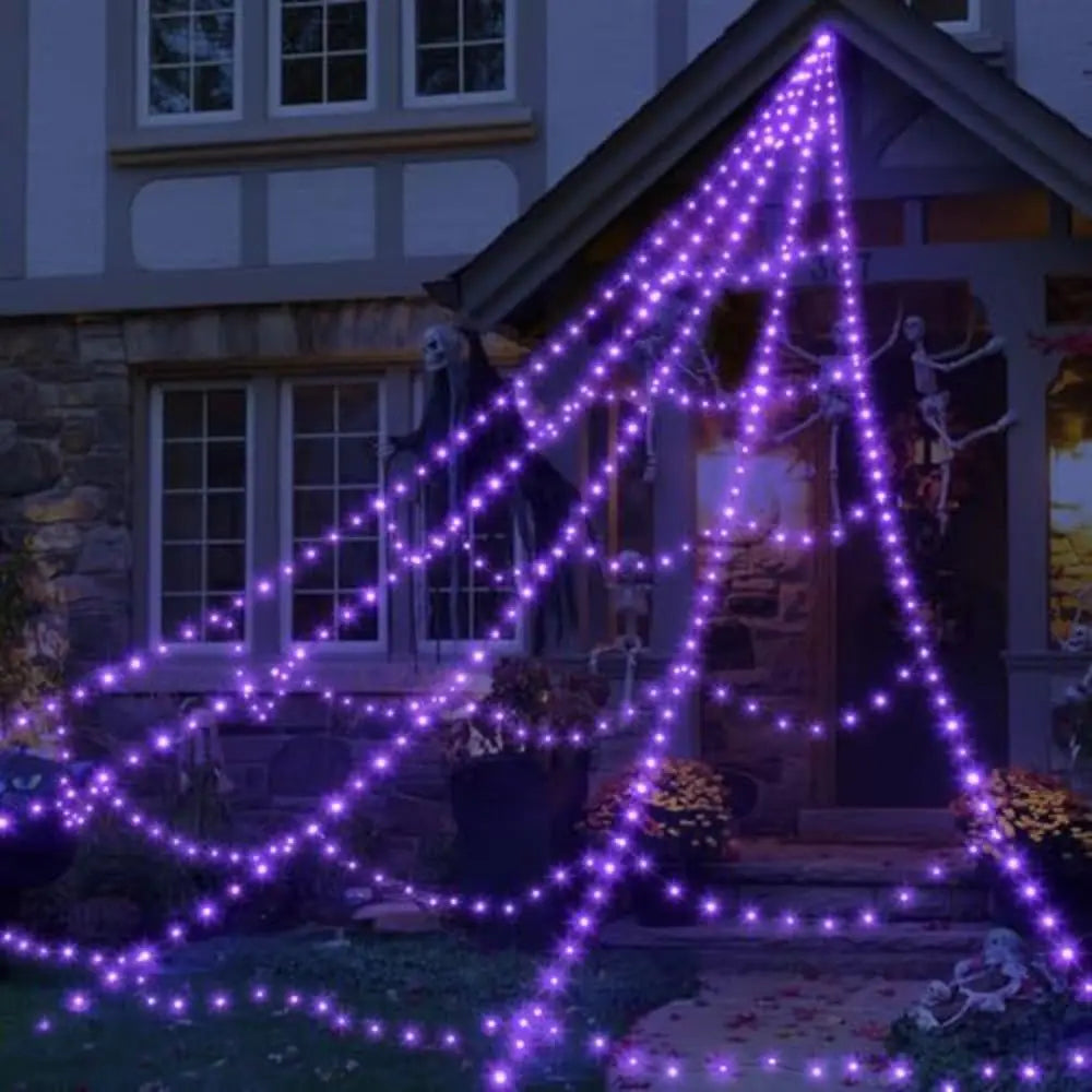 Purple triangular web lights outside a staged house