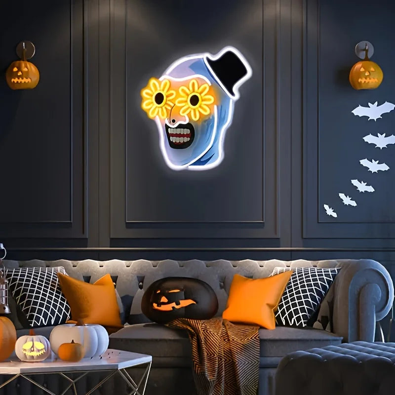 Skull wall sign above a sofa with pumpkins