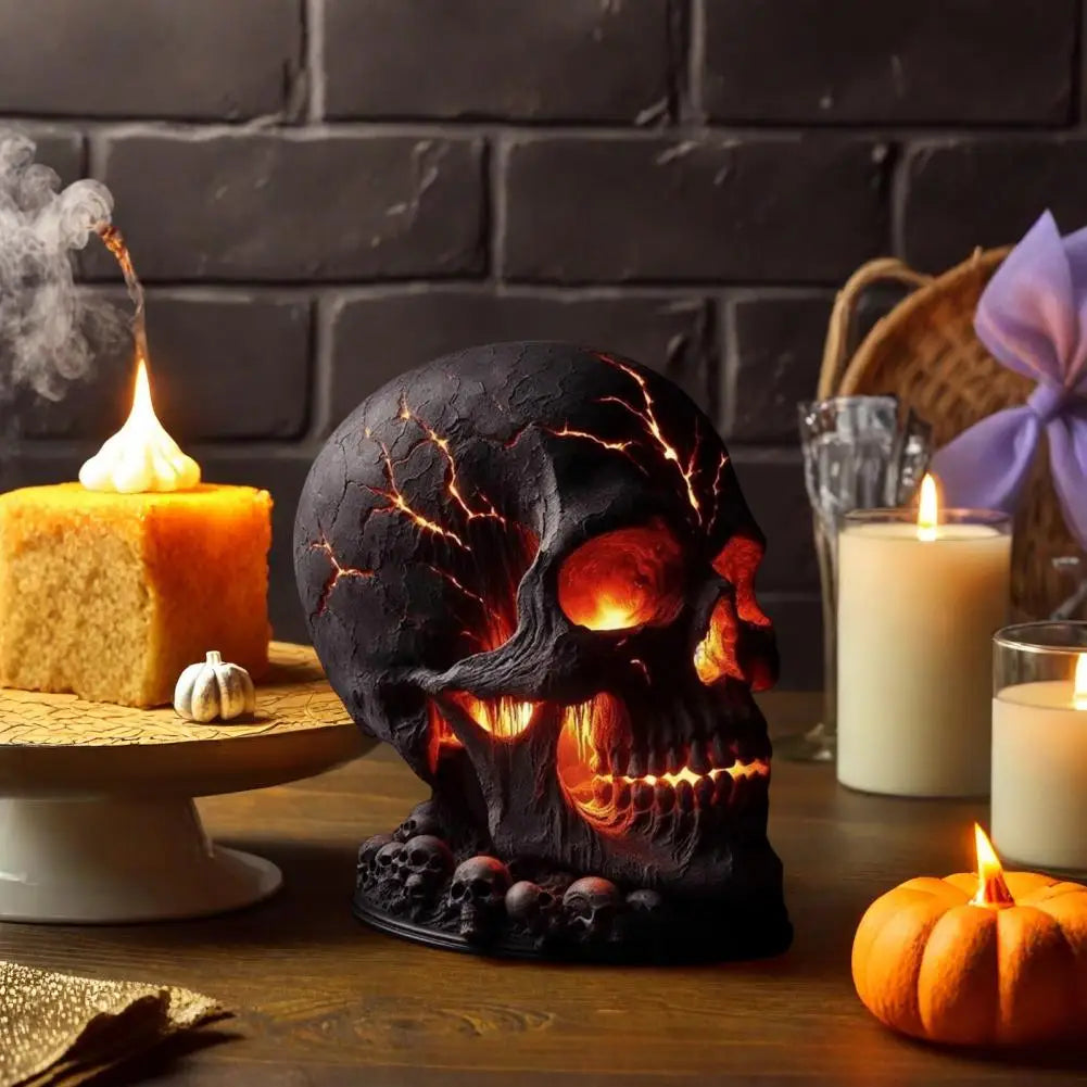 Skull-style lamp beside candles and a pumpkin