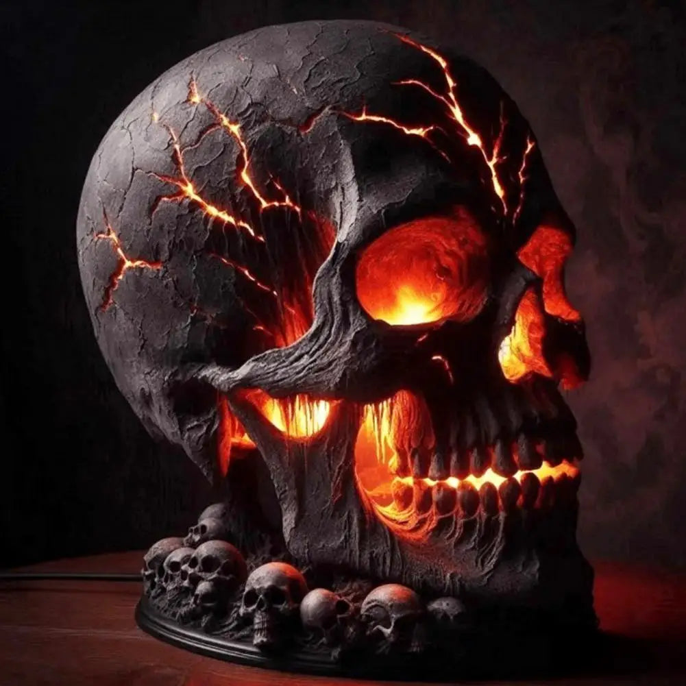 Glowing cracked skull lamp on a dark background