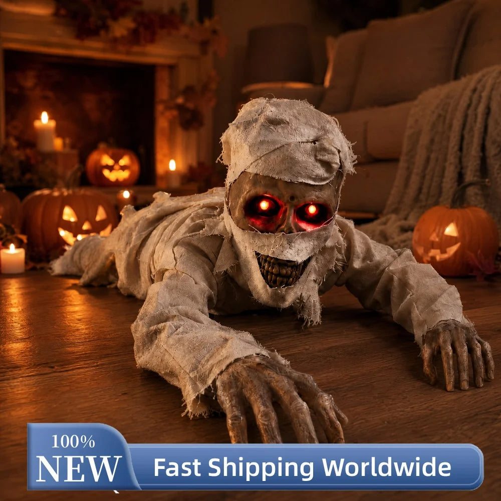 Crawling mummy with red eyes in a staged indoor Halloween display