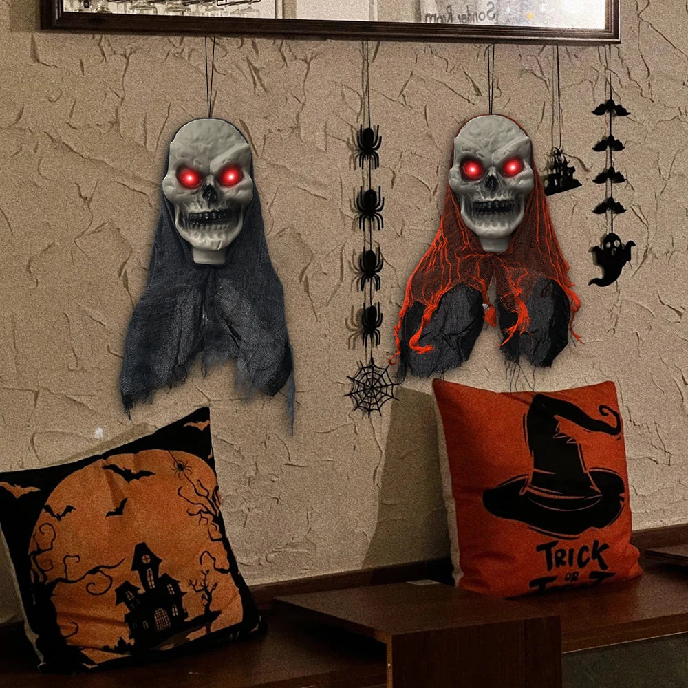 Two larger skull ghosts styled on an indoor wall