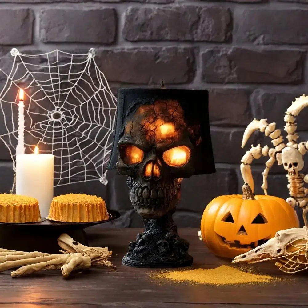 Skull-and-shade lamp on a decorated table