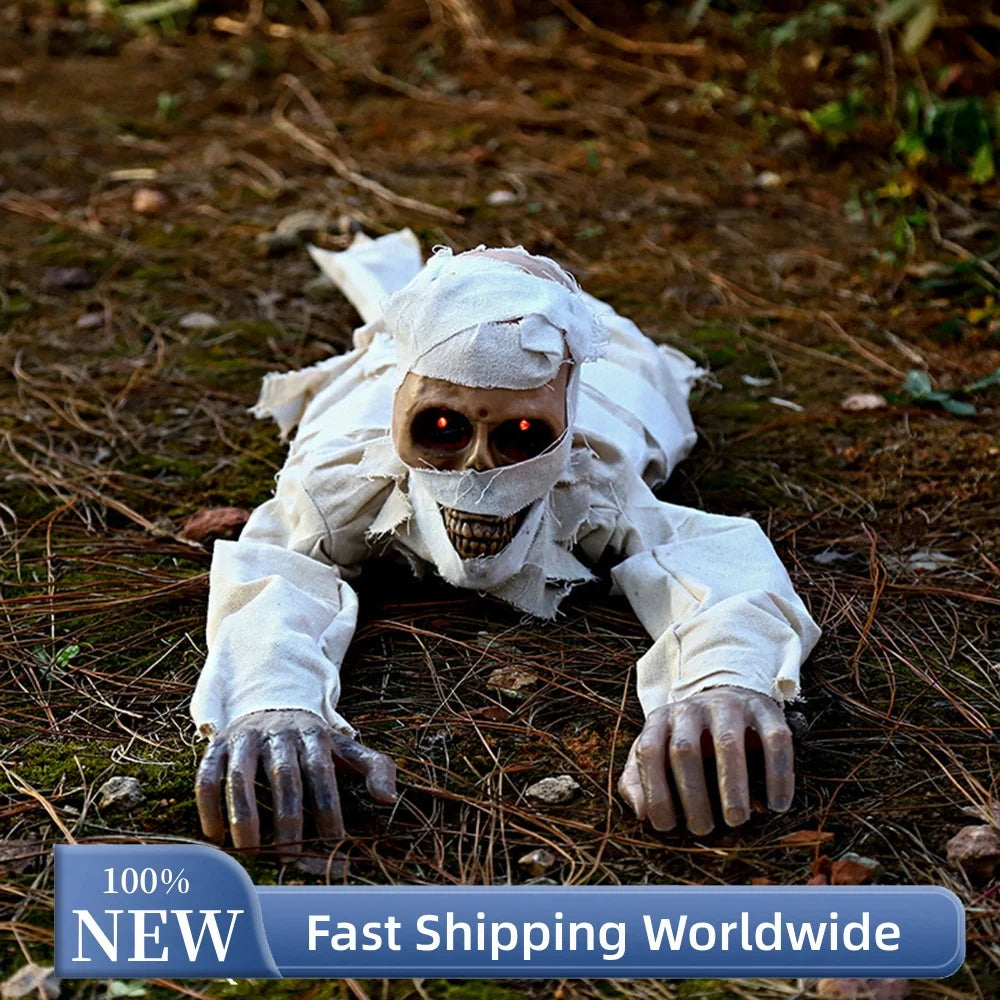 Unlit mummy prop showing gray wrapping and skeleton hands