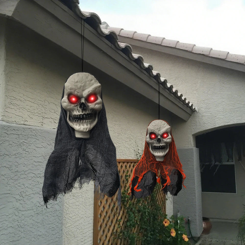 Black and orange skull ghosts in a covered display