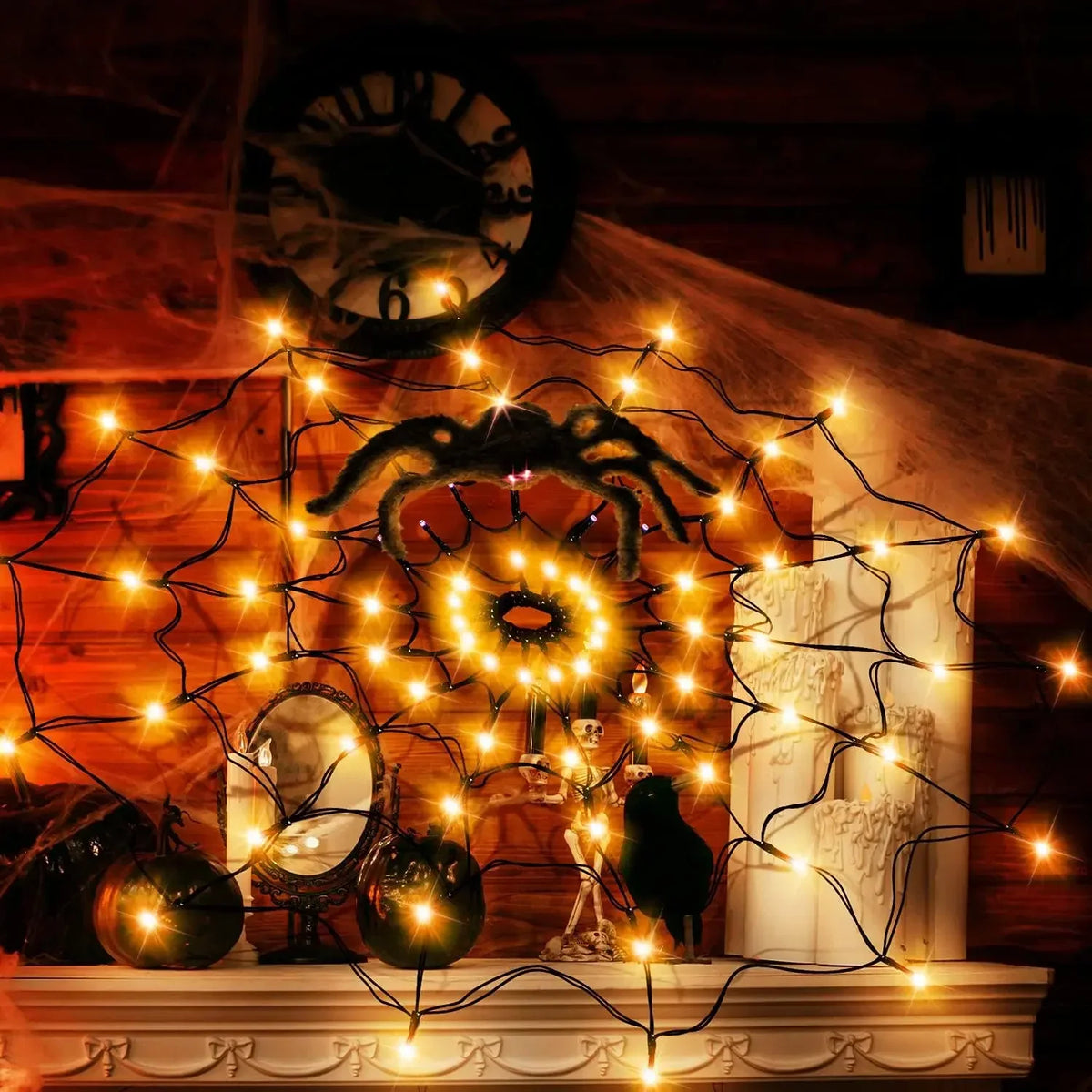 Orange web light on a Halloween mantel